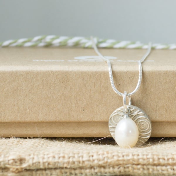 Silver Necklace with a Circle charm and Freshwater Pearl