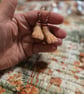 Serial killer trophy Chopped off feet earrings