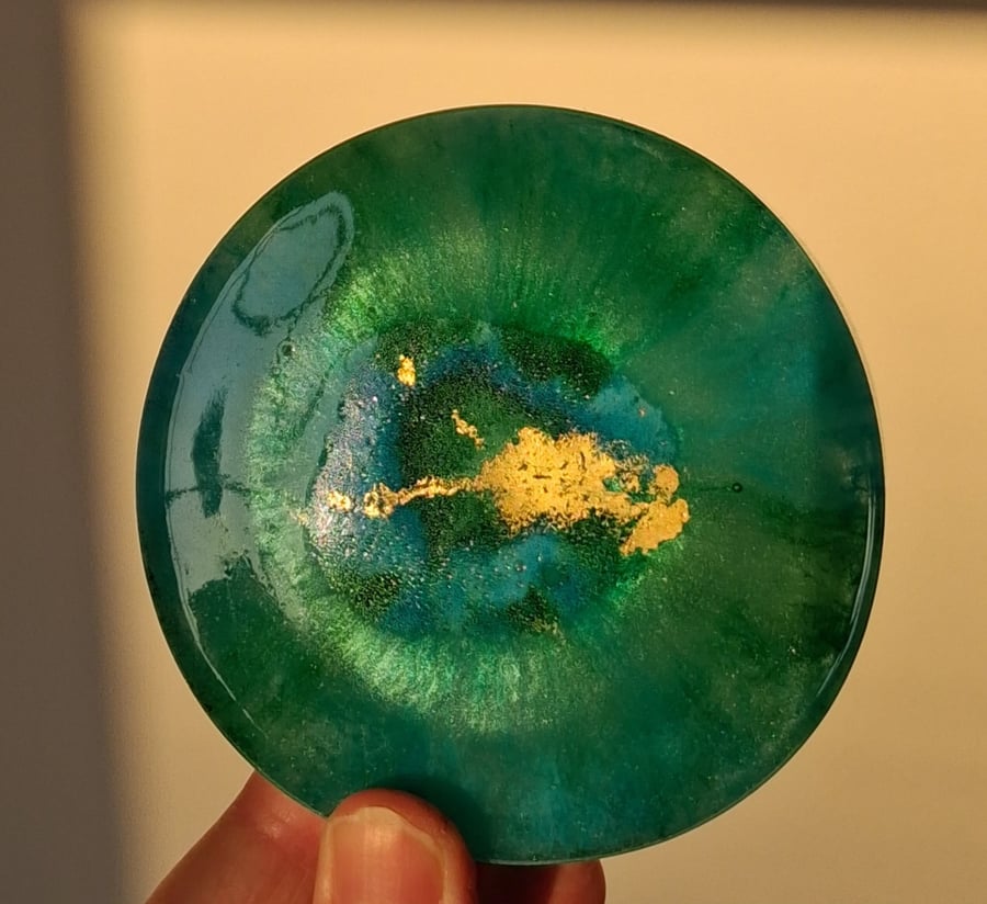 Handmade epoxy resin round coaster or paperweight. Green, blue, gold