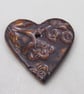 Medium Dark Copper Brocade Texture Heart Shaped Ceramic Pendant - Image 1