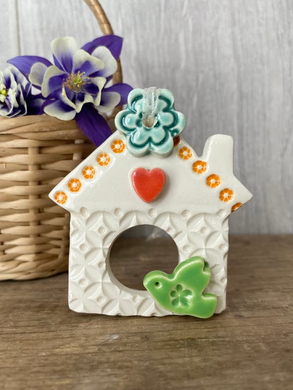 Small Ceramic bird house decoration with green bird
