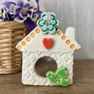Small Ceramic bird house decoration with green bird