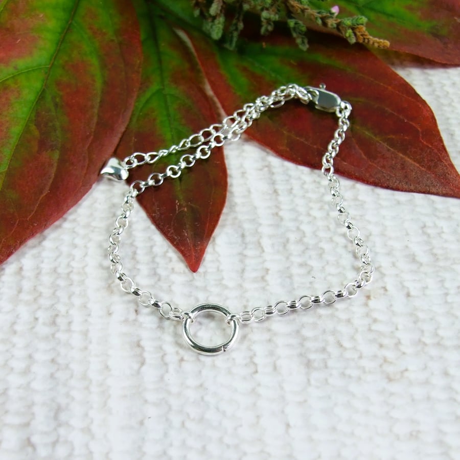 Sterling Silver Bracelet. Adjustable fit with Small Circle