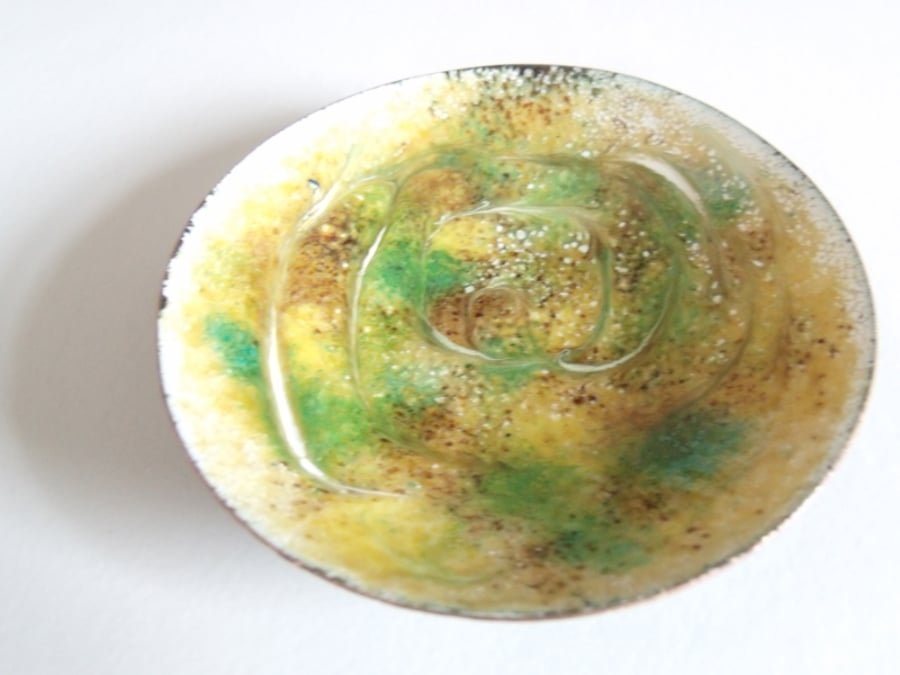 enamelled bowl - green and brown scrolled on yellow over white