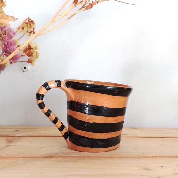 Ceramic hand made wonky quirky novelty stripey mug, whimsical curiosity mug