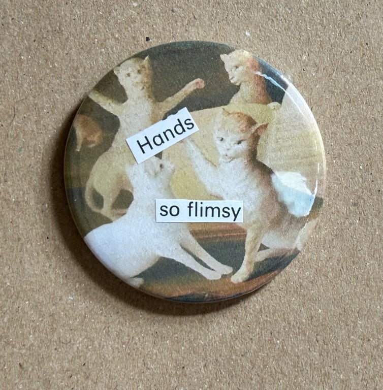 Collage pin badge - medieval cat meme - hands so flimsy