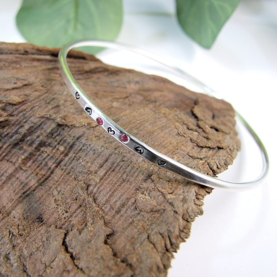 Sterling Silver Narrow Bangle with Hearts and Rubies