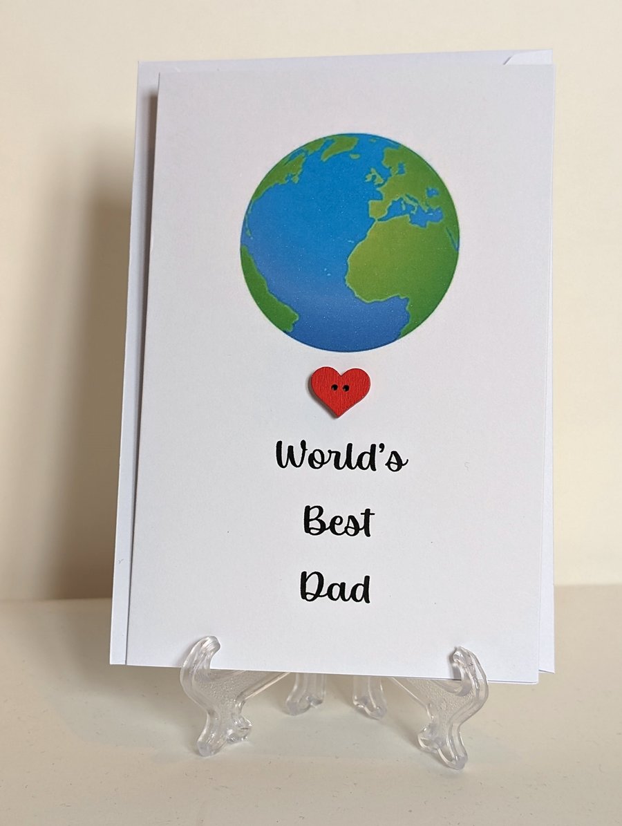 World's Best Dad greetings card with a red heart button next to the world