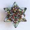 multicolour six point star brooch