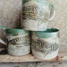 Small rustic mug,tea cup, linocut design mackerel in green
