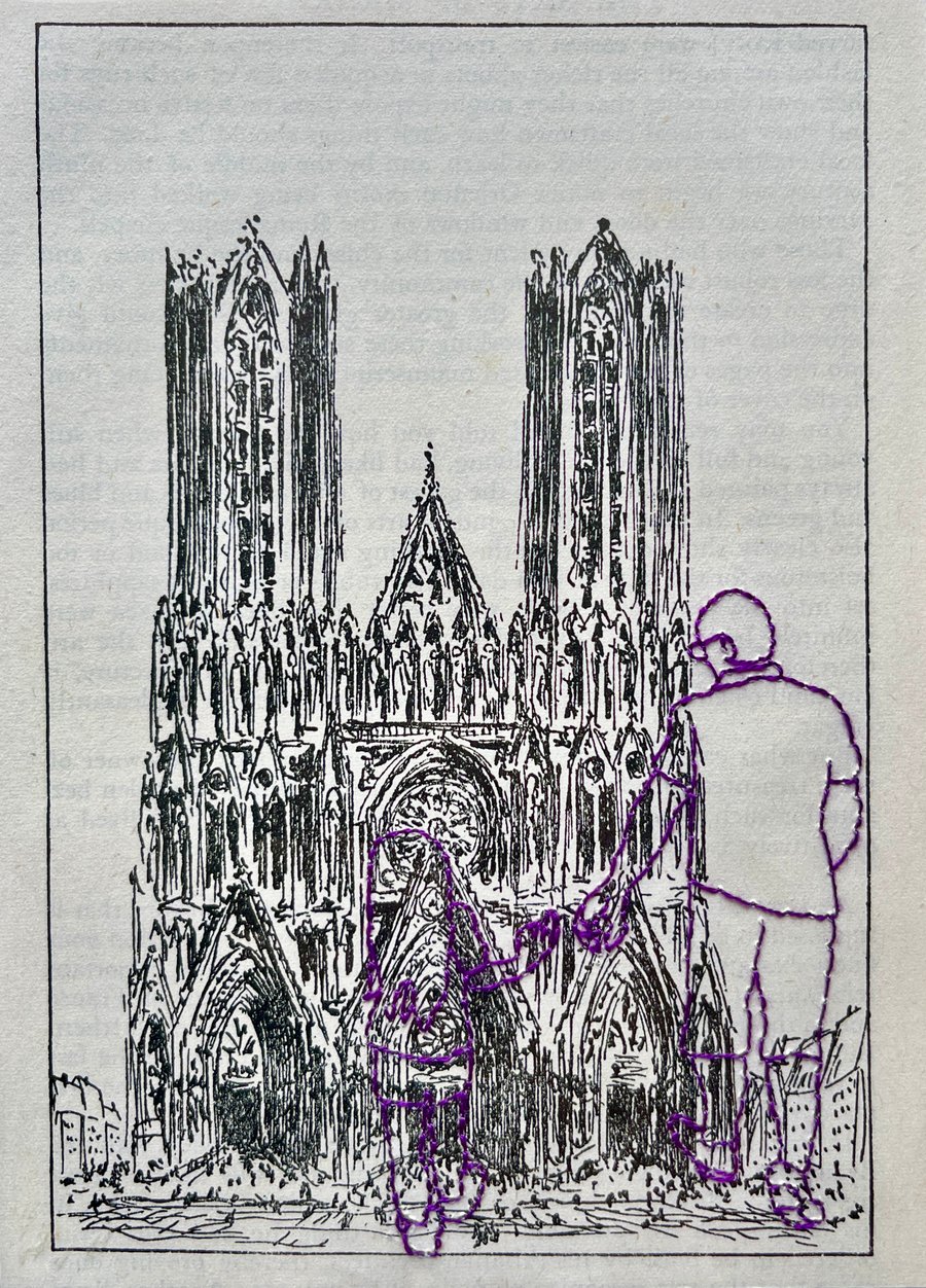 Hand embroidered vintage book page