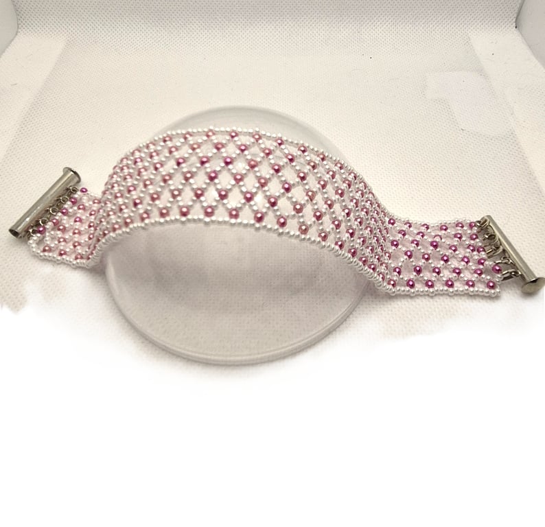 White netted bracelet with pink Swarovski pearls