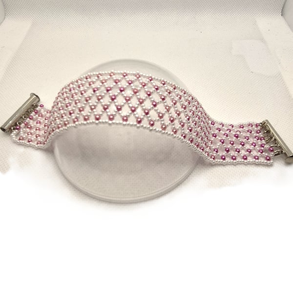 White netted bracelet with pink Swarovski pearls