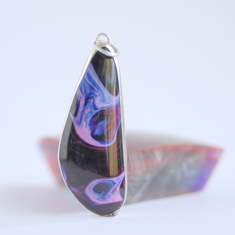 Swirly purple bowlerite pendant