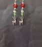 Beaded red and green Christmas dangle earrings  with silver stag charms  - Image 2