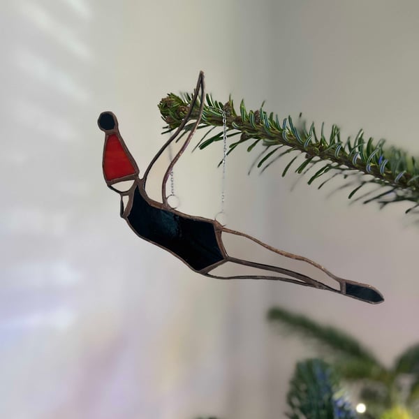 Wild Swimmer with Santa bobble hat stained glass tree decoration