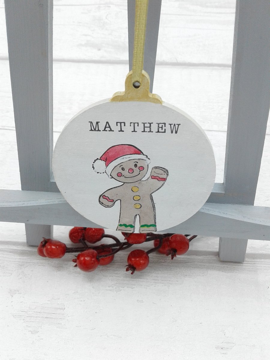 Personalised Christmas tree decoration. Wooden bauble. Gingerbread man.