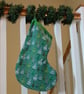 Handmade Christmas stocking - Scandi style trees on green background