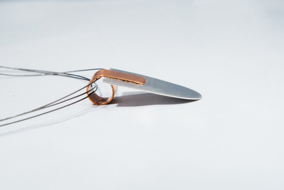 Vega by Fedha - elegant pendant in silver and copper on silver cable wire