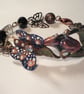 Lily flower and butterfly bracelet