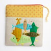 Oatmeal linen make up bag with hand stitched interlocking fish