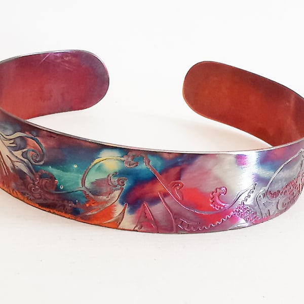 copper octopus cuff with heat coloured finish