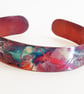 copper octopus cuff with heat coloured finish