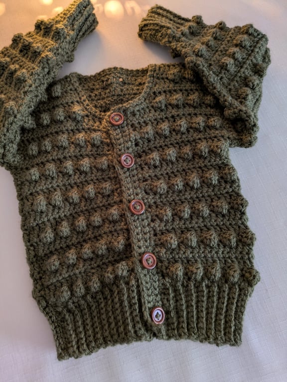 Olive green bobble knit cardigan for a newborn baby boy 