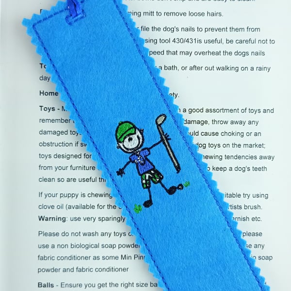 Golfer Bookmark - Golfer holding a golf club embroidered on a felt bookmark 