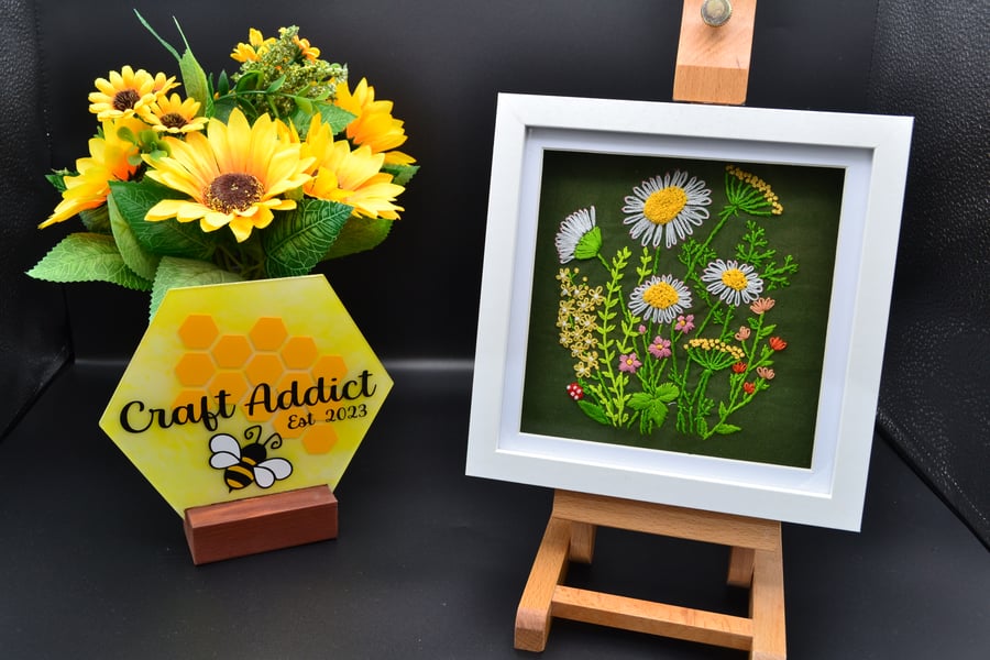 Framed hand stitched artwork