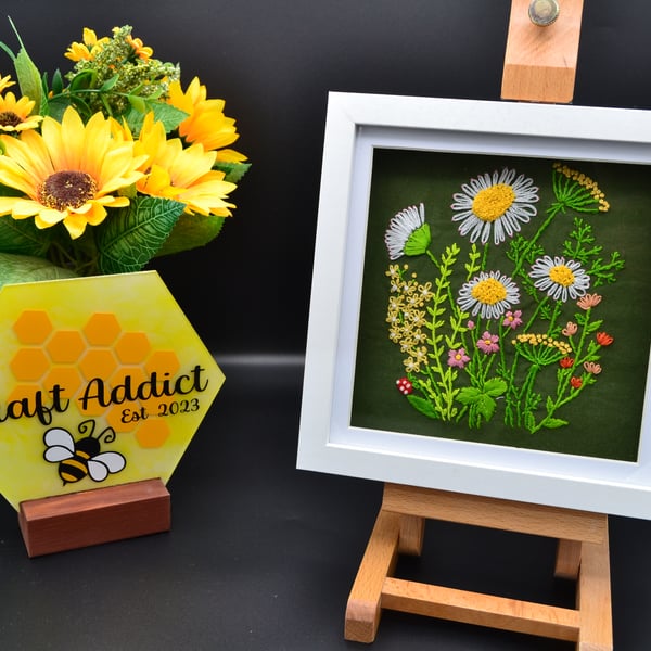 Framed hand stitched artwork