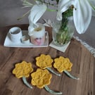 Knitted flower coasters