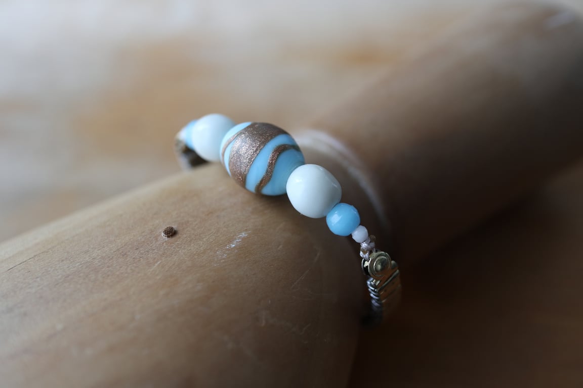 Upcycled Baby Blue Ceramic and Glass Beads - Stainless Steel stretchy bracelet 