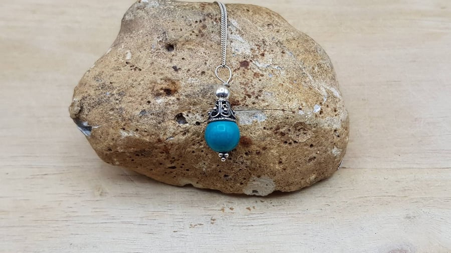 Small minimalist Turquoise cone pendant. December birthstone necklace