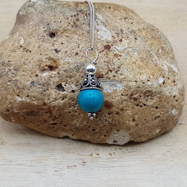 Small minimalist Turquoise cone pendant. December birthstone necklace