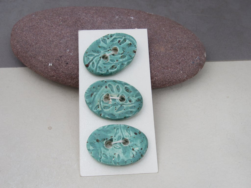 3 Medium Oval Eggshell Blue Leaf Pattern Ceramic Buttons