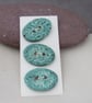 3 Medium Oval Eggshell Blue Leaf Pattern Ceramic Buttons - Image 1