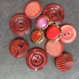 Red assortment of pre loved buttons