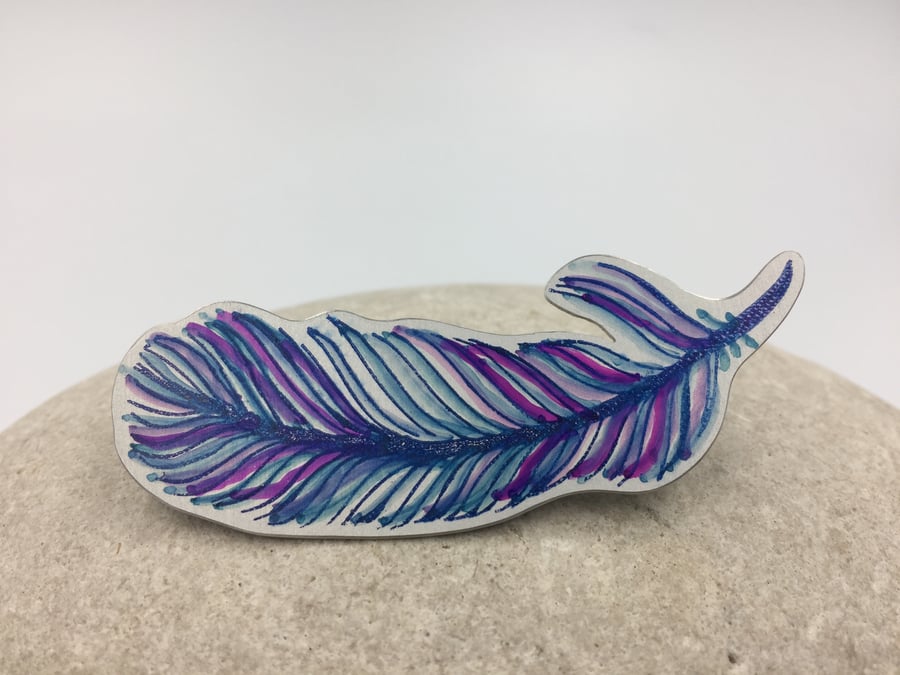 Anodised aluminium pink and blue handmade feather brooch.