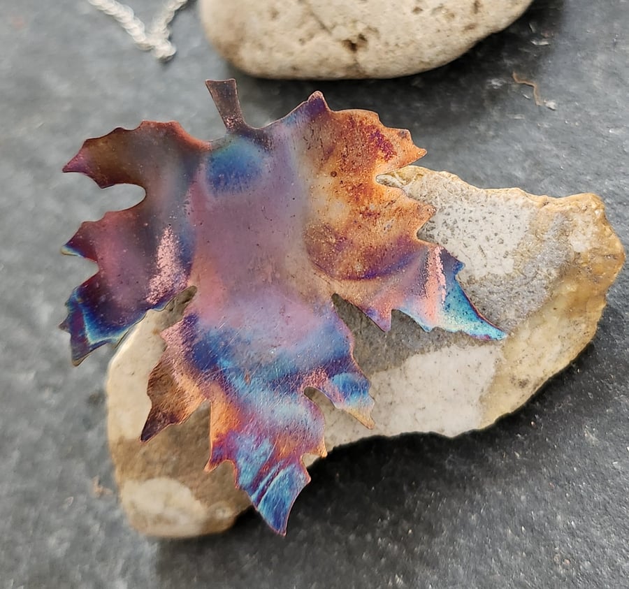 Flame painted copper leaf brooch