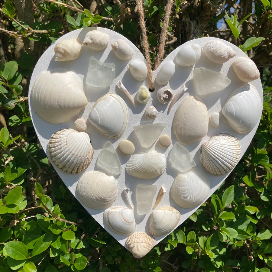 Hanging wood heart with shells, sea glass and pebbles from Cornwall 