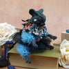 'La-la-lapis', a porcelain and textile mouse doll.