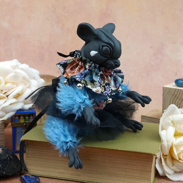 'La-la-lapis', a porcelain and textile mouse doll.
