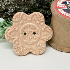 Large ceramic flower shaped button peach colour