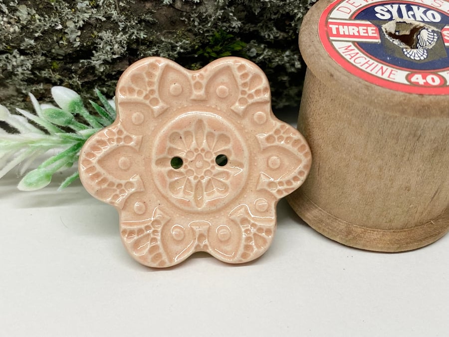 Large ceramic flower shaped button peach colour
