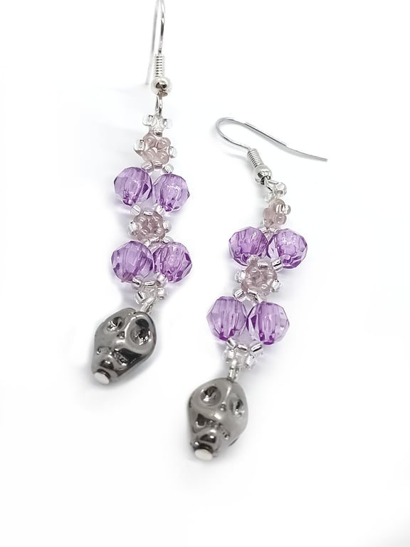 Purple and silver skull dangle earrings