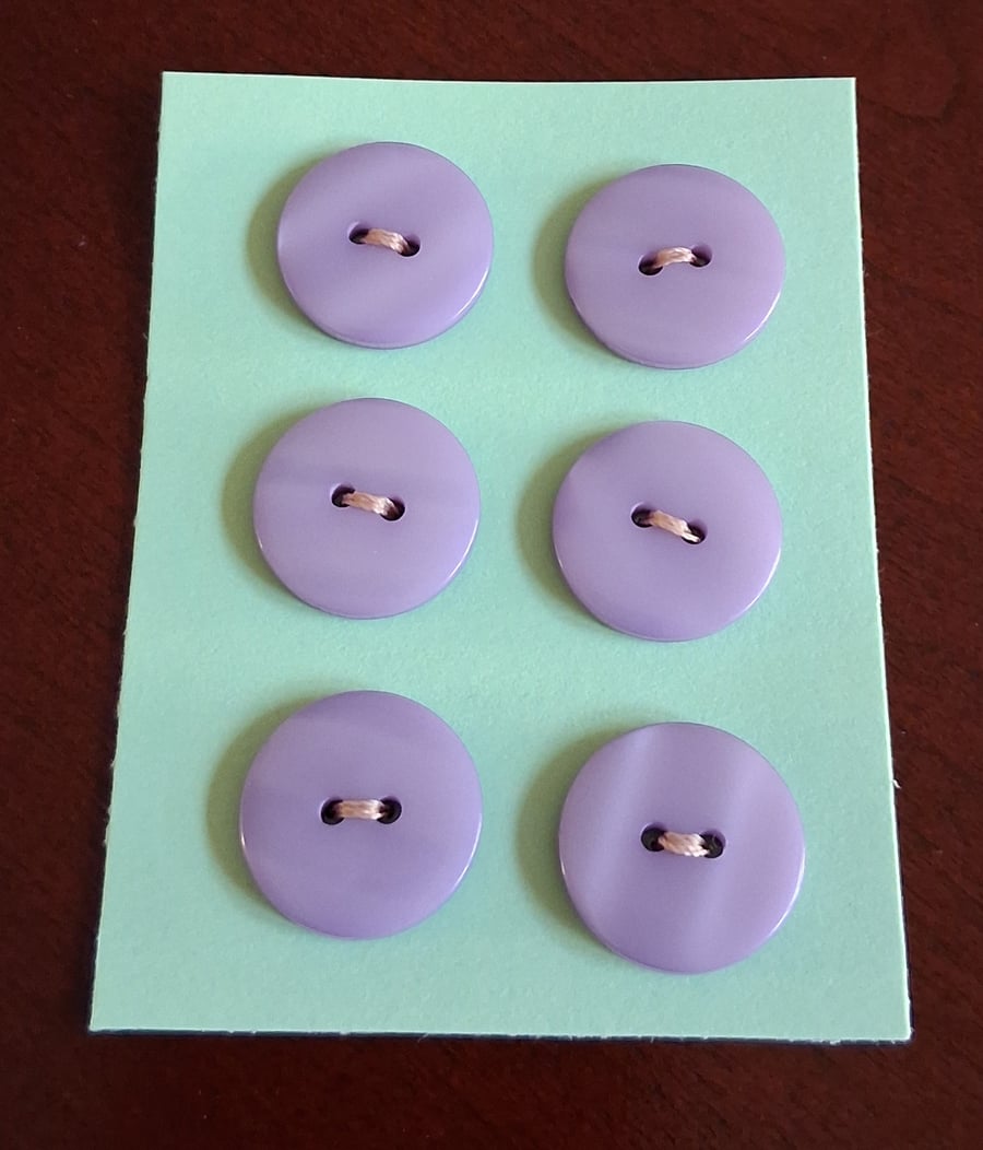 19MM LILAC BUTTONS WITH TWO HOLES FOR SEWING.