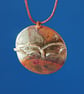 Bat in Clouds Circular Copper Pendant - Image 1