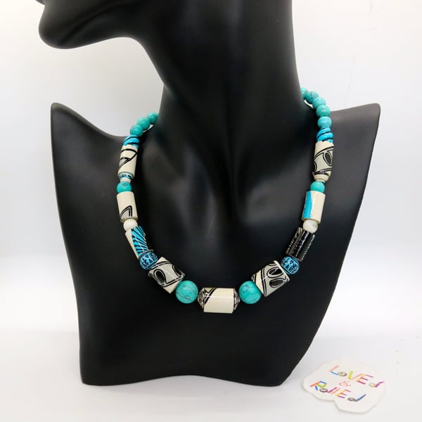Black, white and blue patterned paper beaded necklace with turquoise separators