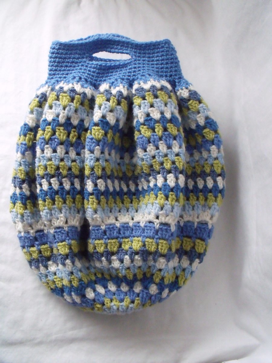 one of a kind crocheted granny bag in blue and green
